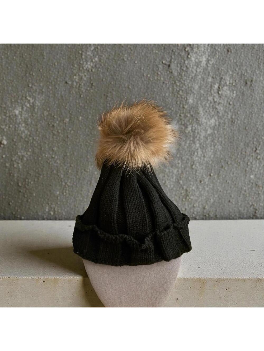 Black cable Knit hat with detailed cuff with camel and black pom pom. NWOT
